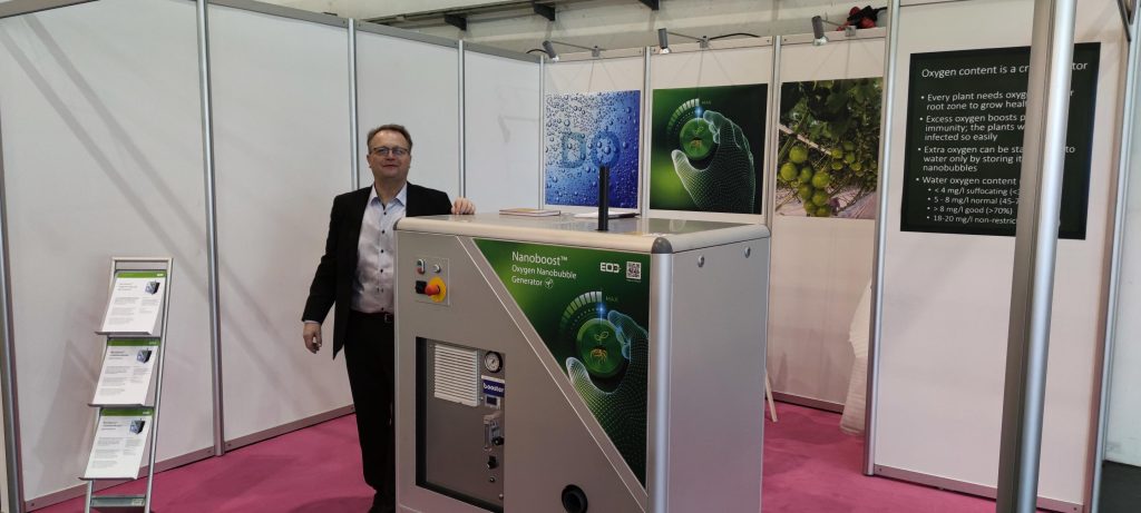 Nanoboost device at the EOD stand, with CEO Timo Kantola at the IPM Essen fair.